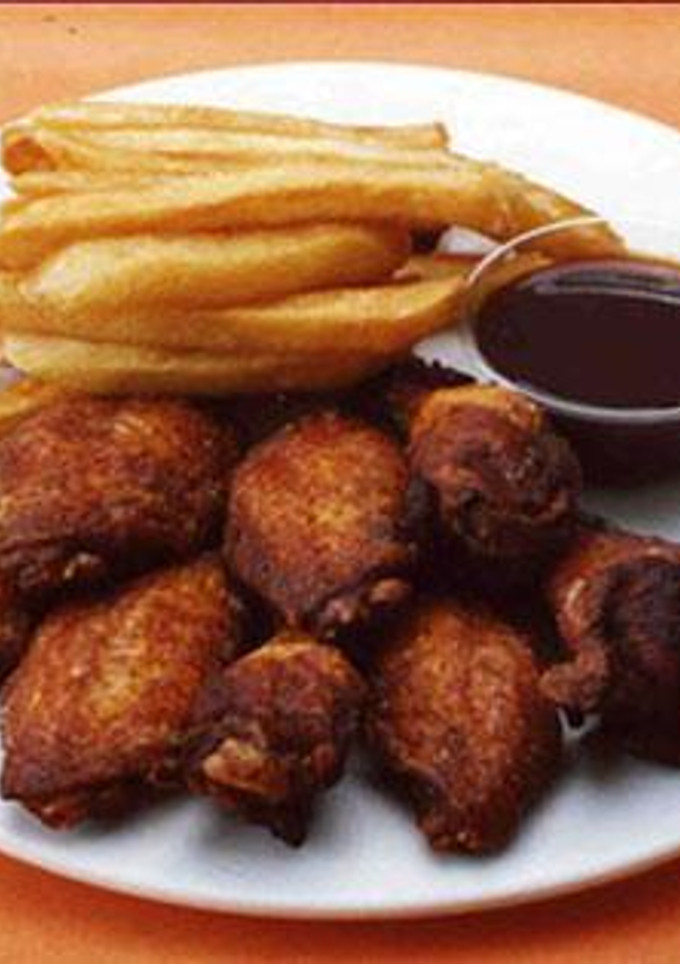 Una foto de Alas de pollo al ajillo