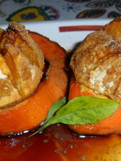 Una foto de Naranjas asadas y caramelizadas