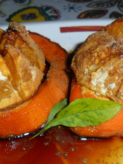 Una foto de Naranjas asadas y caramelizadas