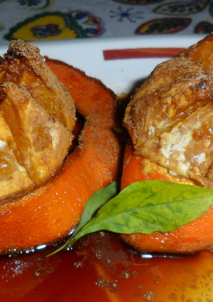 Una foto de Naranjas asadas y caramelizadas