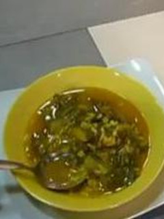 Una foto de Arroz caldoso con acelgas y jamón
