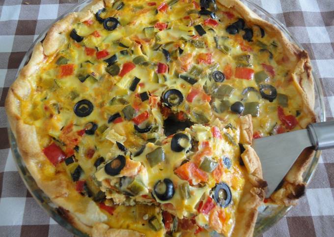 Foto principal de Tarta de verduras con aceitunas y mozzarella
