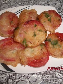 Una foto de Rodajas de tomate abuñoladas