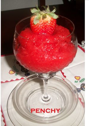 Una foto de Sorbete de fresas y naranjas al cava