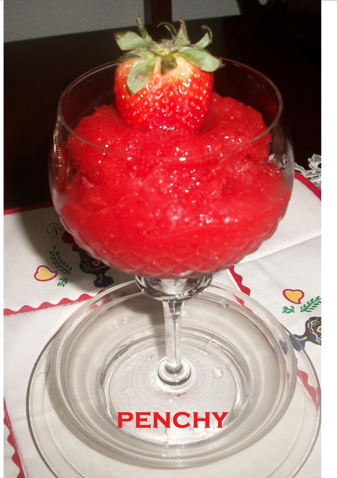 Una foto de Sorbete de fresas y naranjas al cava