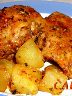 Una foto de Cordero lechal asado con patatas
