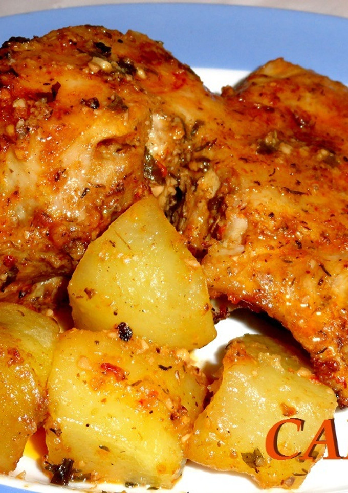 Una foto de Cordero lechal asado con patatas