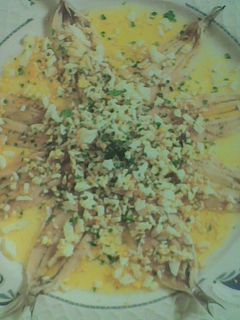 Una foto de Boquerones en vinagre con ajo y perejil caseros