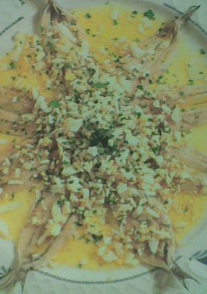 Una foto de Boquerones en vinagre con ajo y perejil caseros