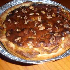 Una foto de Tarta de calabaza, nueces y hojaldre