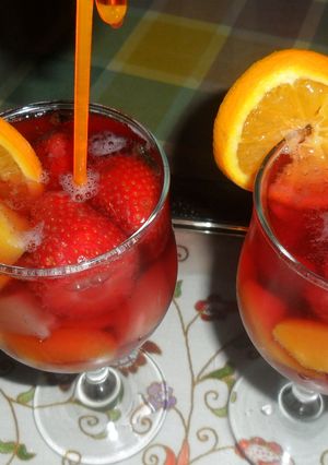 Una foto de Cup de vino rosado