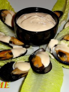 Una foto de Mejillones con alioli