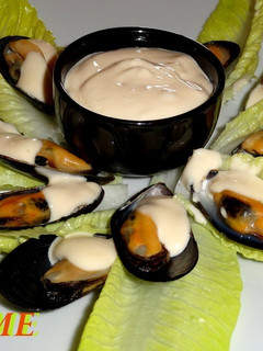 Una foto de Mejillones con alioli