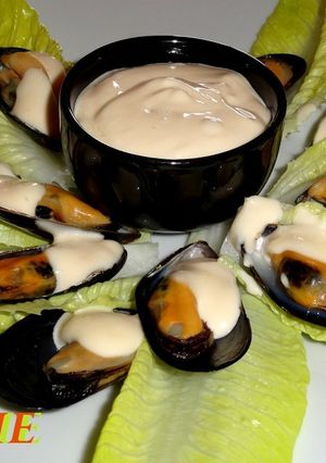 Una foto de Mejillones con alioli