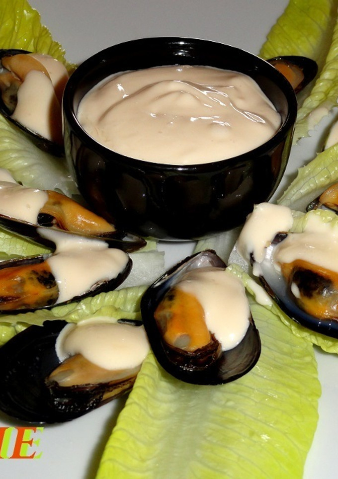 Una foto de Mejillones con alioli