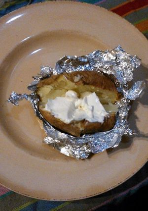 Una foto de Papas en paquete con queso de untar Finlandia
