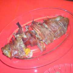 Una foto de Solomillo relleno de melocotón envuelto en serrano