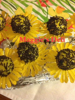Una foto de Cake pops de girasoles