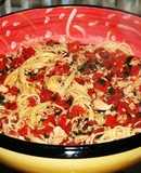 Linguini con almejas en salsa de tomate