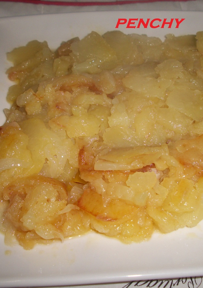 Una foto de Patatas a lo pobre al vino blanco