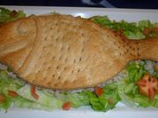 Una foto de ensalada con choclo