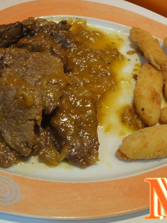 Una foto de Solomillo ibérico a la naranja