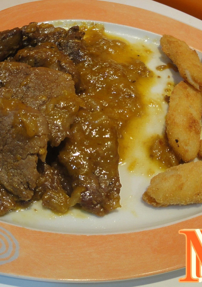 Una foto de Solomillo ibérico a la naranja