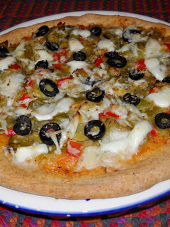 Una foto de Pizza semi integral de verdura