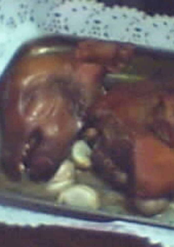 Una foto de Cabeza de cochinillo al horno