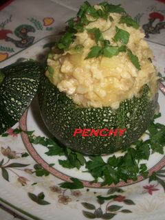 Una foto de Calabacita rellena de bacalao al ajillo