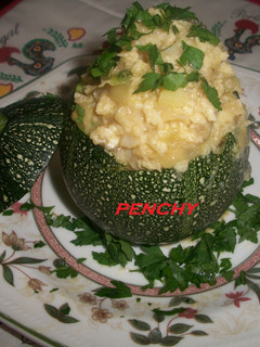 Una foto de Calabacita rellena de bacalao al ajillo