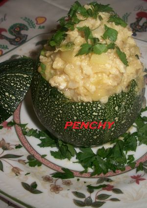 Una foto de Calabacita rellena de bacalao al ajillo