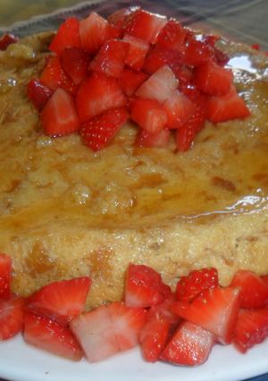 Una foto de Puding con fresas acarameladas