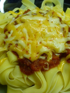 Una foto de Tagliatelle con boloñesa y 4 quesos