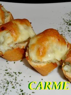 Una foto de Montaditos de bacalao agridulce gratinados