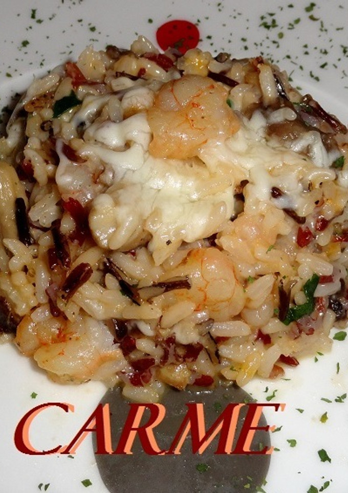 Una foto de Arroz con gambas, setas y cuatro quesos