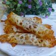Canapés rollo de queso con salmón
