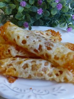 Una foto de Canapés rollo de queso con salmón