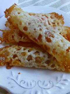 Una foto de Canapés rollo de queso con micuit-foie