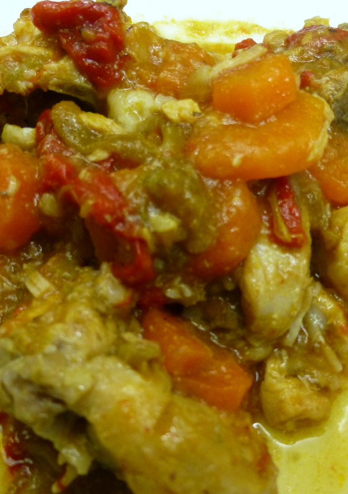 Una foto de Conejo en salsa con zanahoria y pimientos