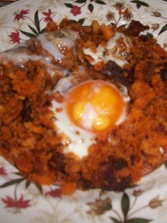Una foto de Migas enriquecidas con huevos escalfados