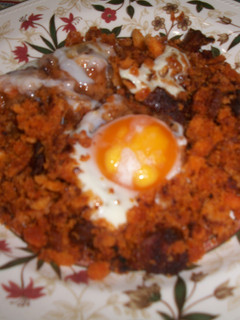 Una foto de Migas enriquecidas con huevos escalfados