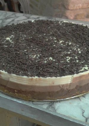 Una foto de Tarta de tres chocolates
