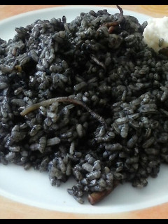 Una foto de Arroz negro con cachón