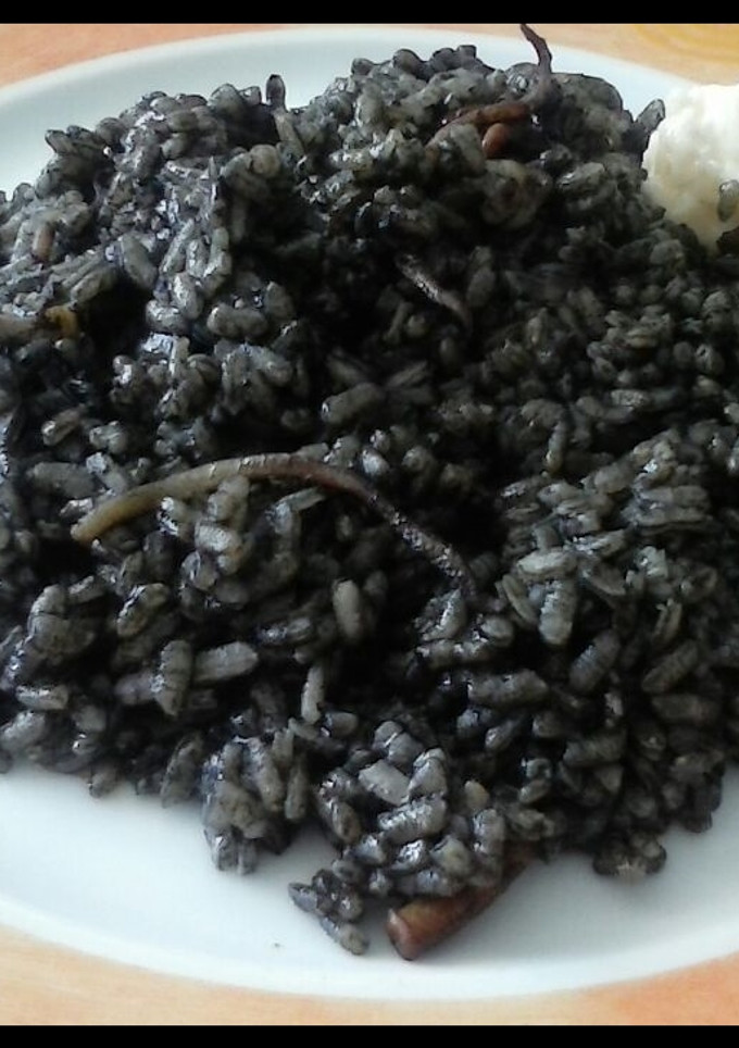 Una foto de Arroz negro con cachón