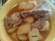 Una foto de lechazo con patatas