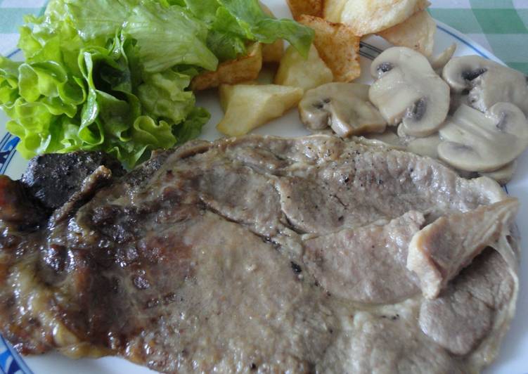 Chuletas de aguja al horno con champiñones