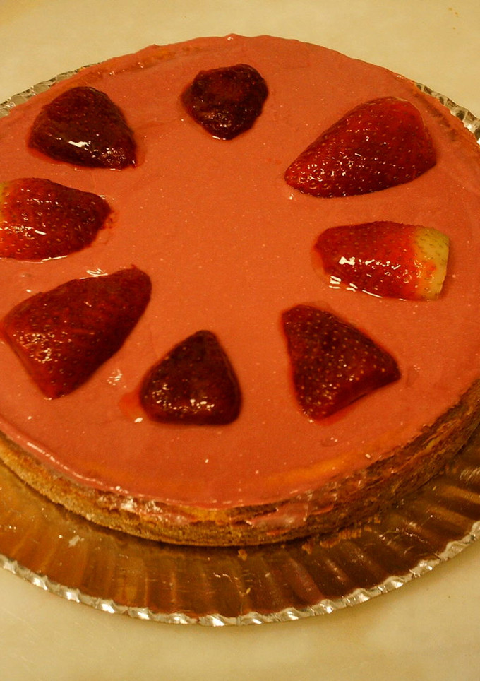 Una foto de Tarta de queso con crema de fresones