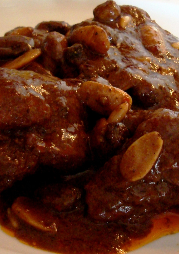 Una foto de Conejo con jerez y frutos secos