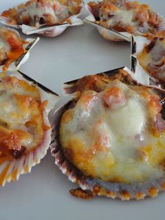 Una foto de Aperitivo de volandeiras al horno
